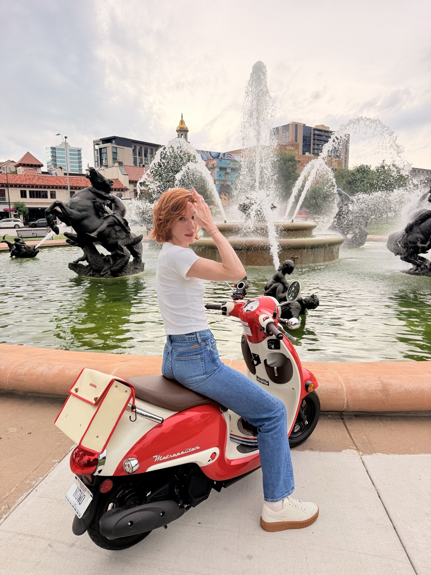 Noelle Paige on her red scooter